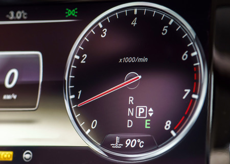 Modern luxury sport car. Speed control dashboard.