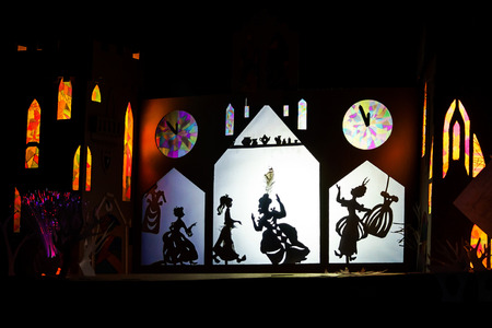 Shadows theater view. Illuminated figures over the screenのeditorial素材