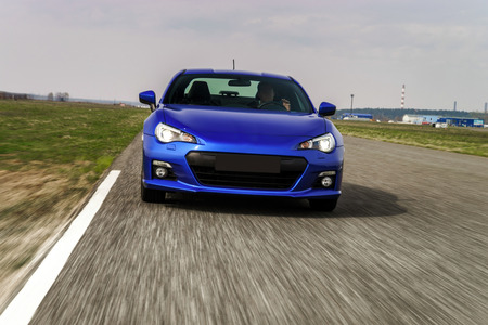 Blue sport car on race way. Motion capture.の写真素材