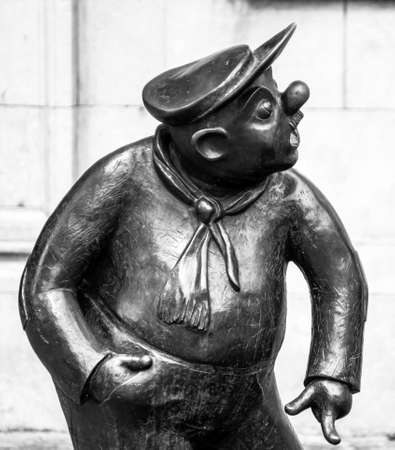 Funny bronze statue of man in the street of  Namur, Belgiumの写真素材