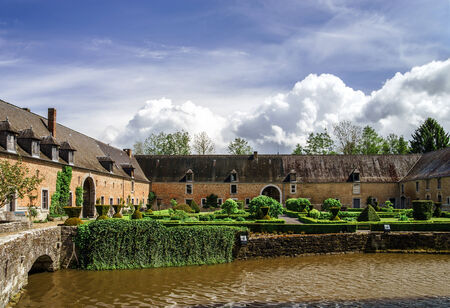 Renovated medieval castle in Belgium. Spring sunny day.のeditorial素材