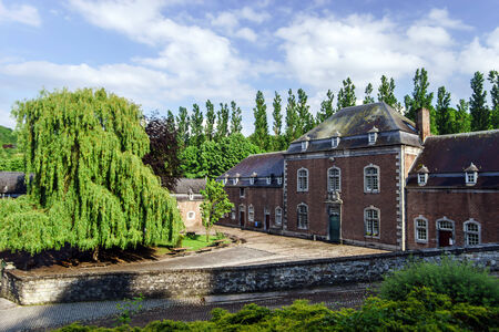 Old abbey in small belgium city. Religious place.の写真素材