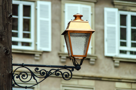 Retro style street lamp in Alsace, Kintzheim,France, evening.の写真素材