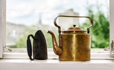 Retro  aeneous teapot and cast iron. Vintage styleの写真素材