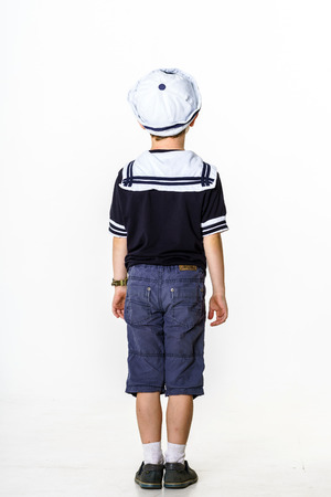 Cute little carroty boy dressed in sailor suitの写真素材