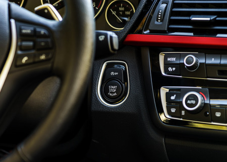 Start-stop button of luxury car dashboard, automobile interiorのeditorial素材