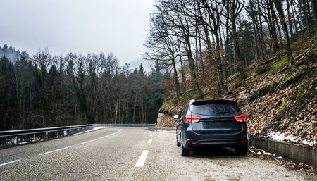New asphalt auto road in Alsace mountains, France, winter
