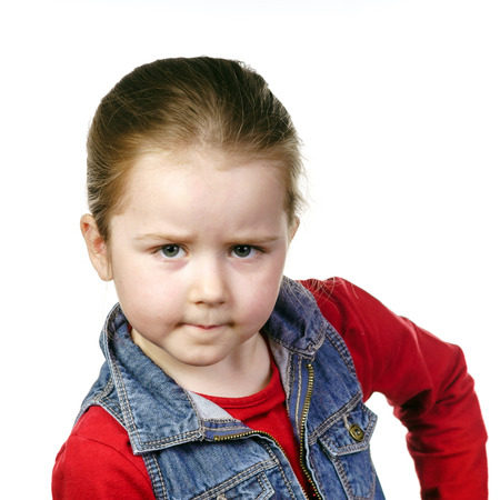 Cute little girl posing in studio, childhood concept, isolated on white