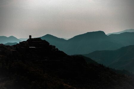 Silhouette of mountains view on sunset, Italy. Travel concept.の写真素材