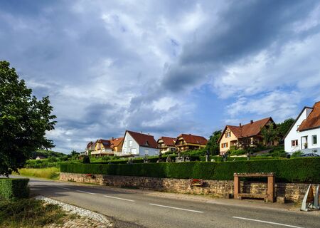 Old alsacien village street view, France, summerの写真素材