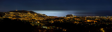 Night panoramic view of Nice with moon light on the sea water, Franceの写真素材