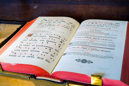 Vintage psalm book with chorus singing notesのeditorial素材