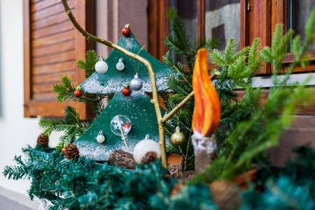 Beautiful Christmas decoration elements on street of alsacien villageの写真素材