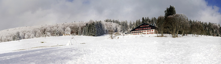 Snow-covered hills wide panoramic view, space and freedomの写真素材