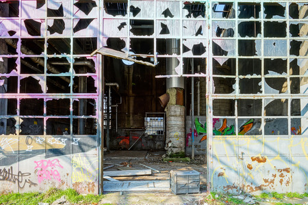 Old abandoned plant with graffity on walls, destroyed ruinsのeditorial素材