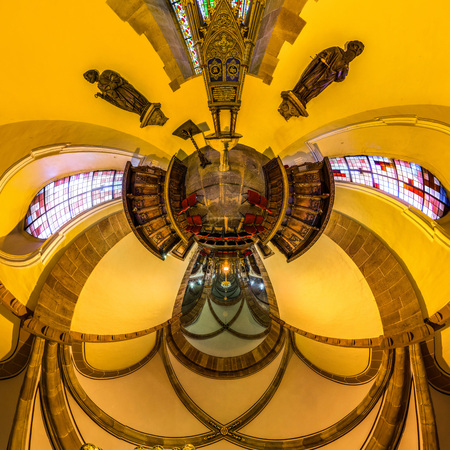 Kaleidoscope view of gothic church interior, little planet effect of panoramic shot. Andlau, France.