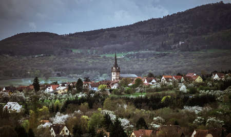Old part of Obernai overview in stormy weather, France