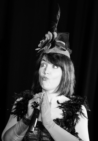 Christel Kern singing chanson. Portrait of french actress. Expressive concert repetition,...