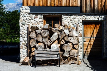 Big firewood stacked near the house, Austriaの写真素材