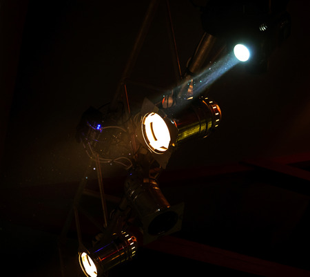 Spotlights over the scene in theater, showtime