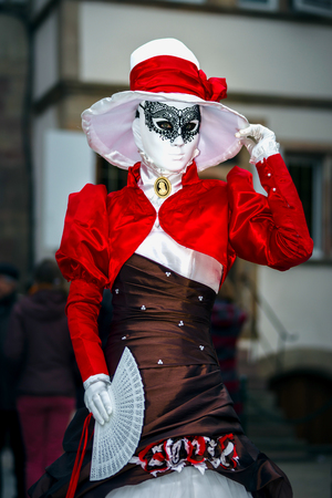 4 March 2017: Rosheim, France: Venetian Carnival Mask - most beautiful masks photographed in open streetのeditorial素材