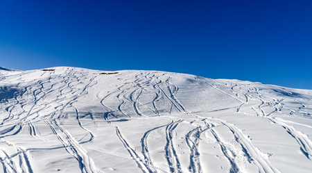 Beautiful winter weather on ski resort in high mountains, Switzerlandの写真素材