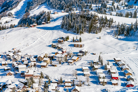 Beautiful winter weather on ski resort in high mountains, Switzerland