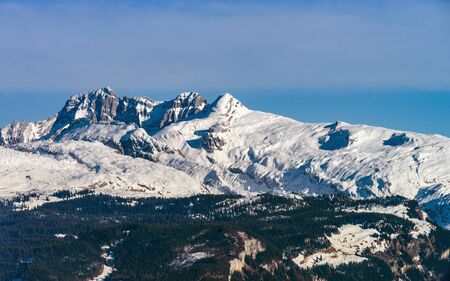 Beautiful mountains in snow. Evening aerial view with shadows.  Switzerland.の写真素材