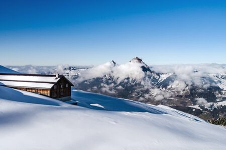 Beautiful mountains in snow. Evening aerial view with shadows.  Switzerland.のeditorial素材