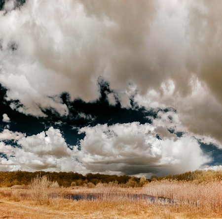 Natural landscape infrared panoramic view with beautiful clouds, Belgiumの写真素材