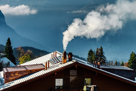 Beautiful alpine peaks view from the top over the clouds, natural landscape , Switzerland