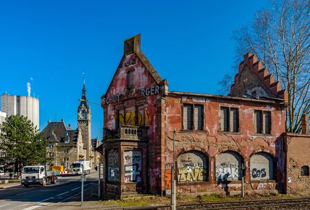 Editorial: 14th March, Strasbourg, France. Old abandoned ruined brick house near insdustrial zone of cityのeditorial素材
