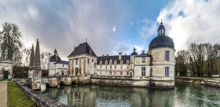 Tanlay castle panoramic view, spring day, cloudy weather, Franceのeditorial素材