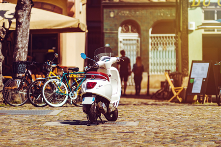 Sunny holidays in old city, Vespa scooter on the street, Strasbourgのeditorial素材
