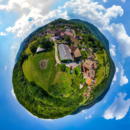 Spherical little planet view of little village Breitenbach in Alsace, Franceの写真素材