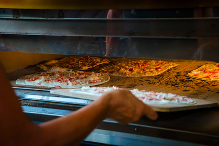Cooking of tarte flambe, classic alsacien , Franceの写真素材
