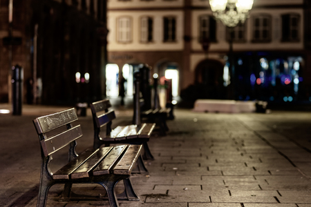 Lonely empty benches on night street in Strasbourg center, Franceの写真素材