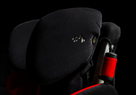 Safety car child seat isolated view, black and red, safety and comfort