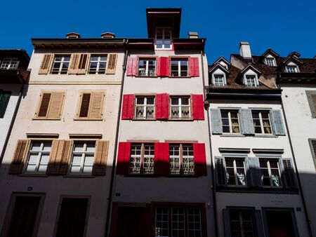 Calm narrow street, sunny summer day, cozy old downtown, Basel, Swissの写真素材