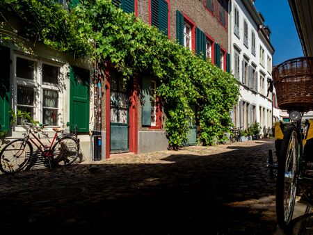 Calm narrow street, sunny summer day, cozy old downtown, Basel, Swiss