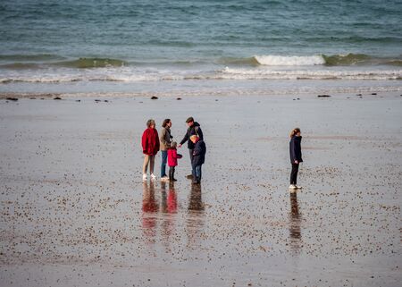 Editorial: 27th October 2019. Saint-Malo, France.  People stroll along the autumn promenade of...