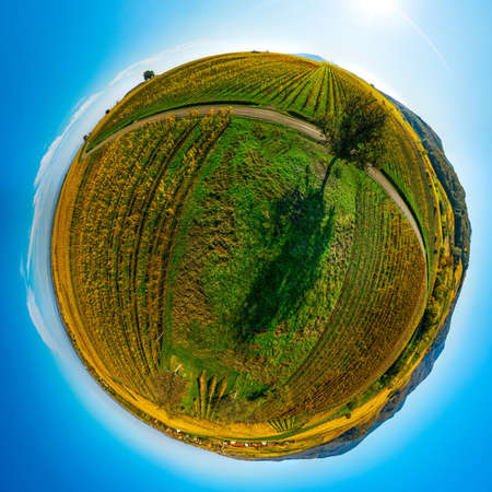Autumn planet. Sunlit valleys, mountains and a variety of autumn colors. Alsace, France. Little...