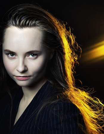 Emotional portrait of a young beautiful girl in Vogue style. Expressive eyes and energetic gaze....