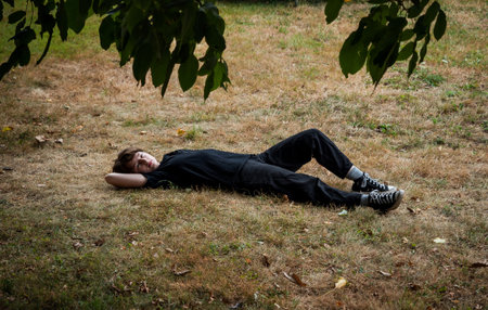 Young teenage girl. Photo in the garden. Freedom and youth. France.