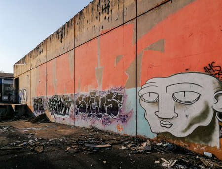Editorial: 7th March 2021: Strasbourg, France. Old factory buildings. Ruin. The walls are painted with graffiti, broken glass on the floor, the roof is full of holes.のeditorial素材
