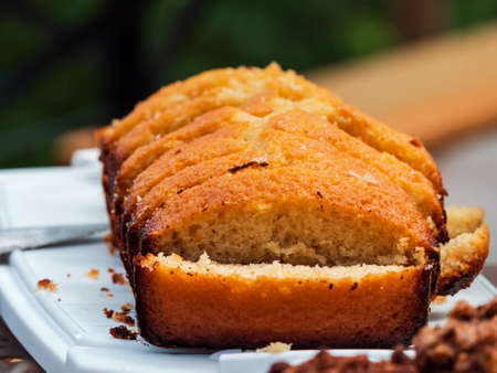 Delicious homemade cakes. Pies with chocolate and berries. Hands reach for the yummy.