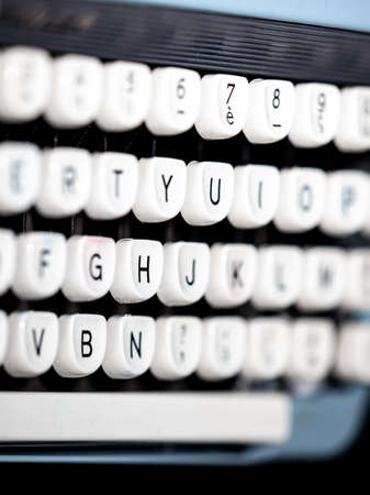 Vintage typewriter, writer or author's tool, inspiration and creativity. On a black background. Close-up.の写真素材