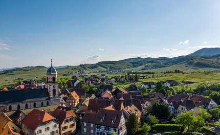 Alsatian village St-Hippolyte. Top aerial view at sunset. Franceの写真素材