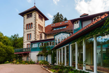Old hotel in the Vosges mountains. Empty hotel. Construction of the beginning of the 20th century. Curious architecture of a mountain resort.の写真素材