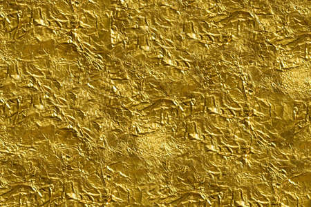 texture of golden foil close up viewの写真素材
